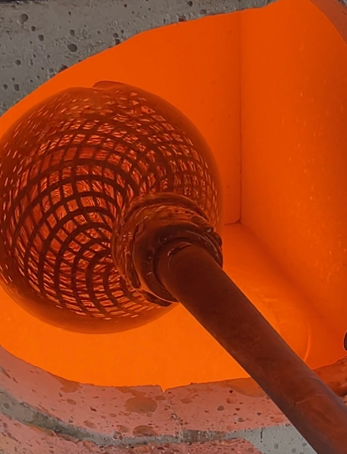 Molten glass with cane technique in the furnace