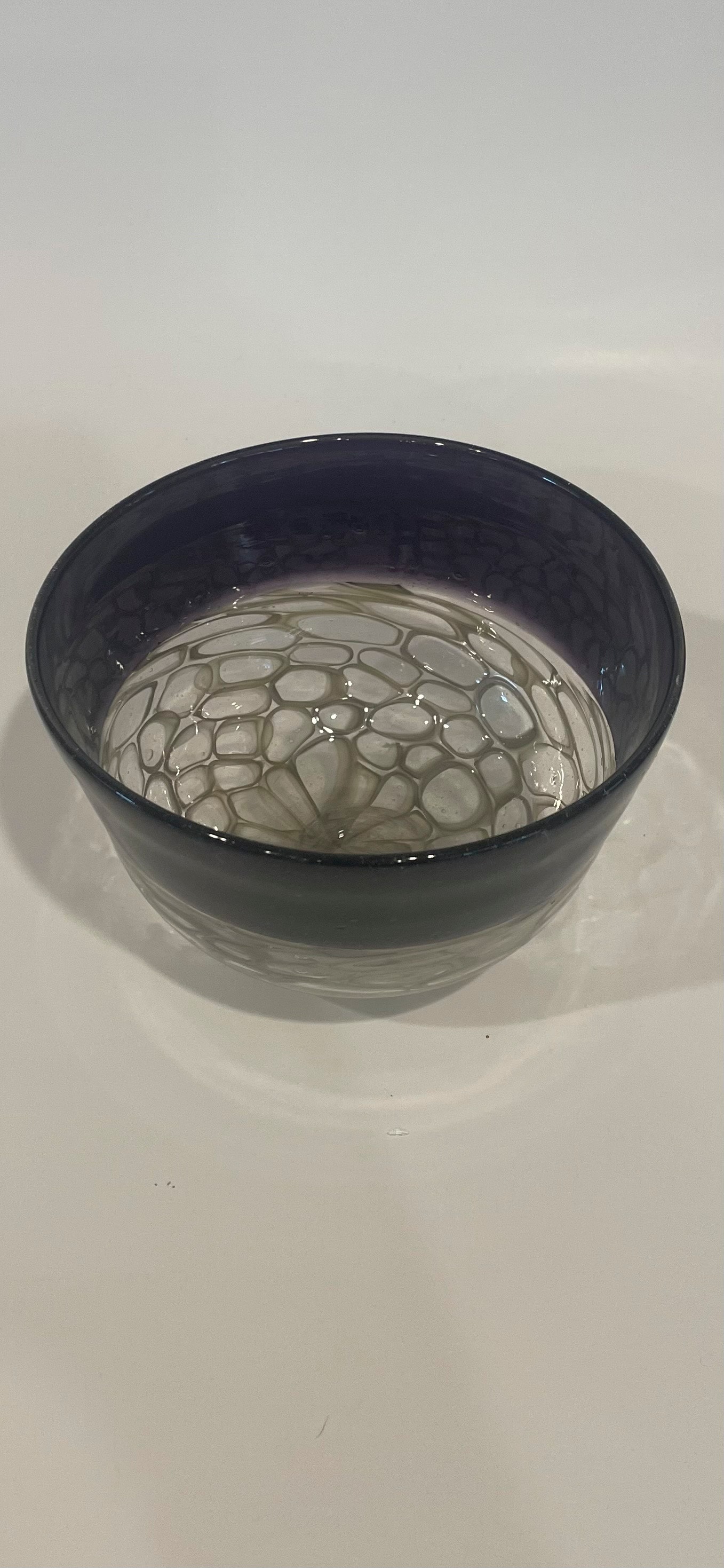 Deep purple blown glass bowl with murrine bubble pattern interior