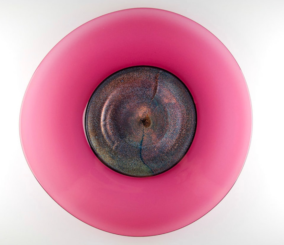 Pink iridescent glass disc