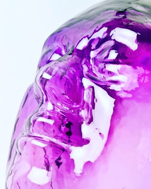 Purple magenta glass sculpture