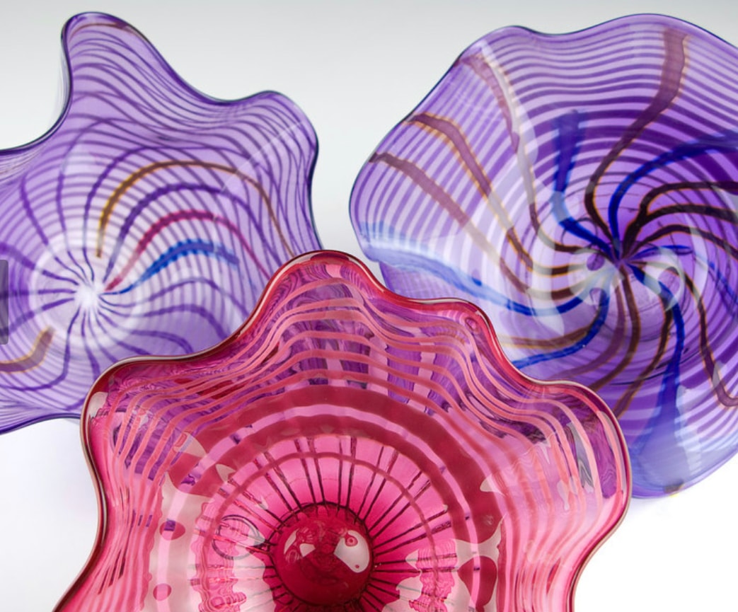 Purple and pink glass bowls