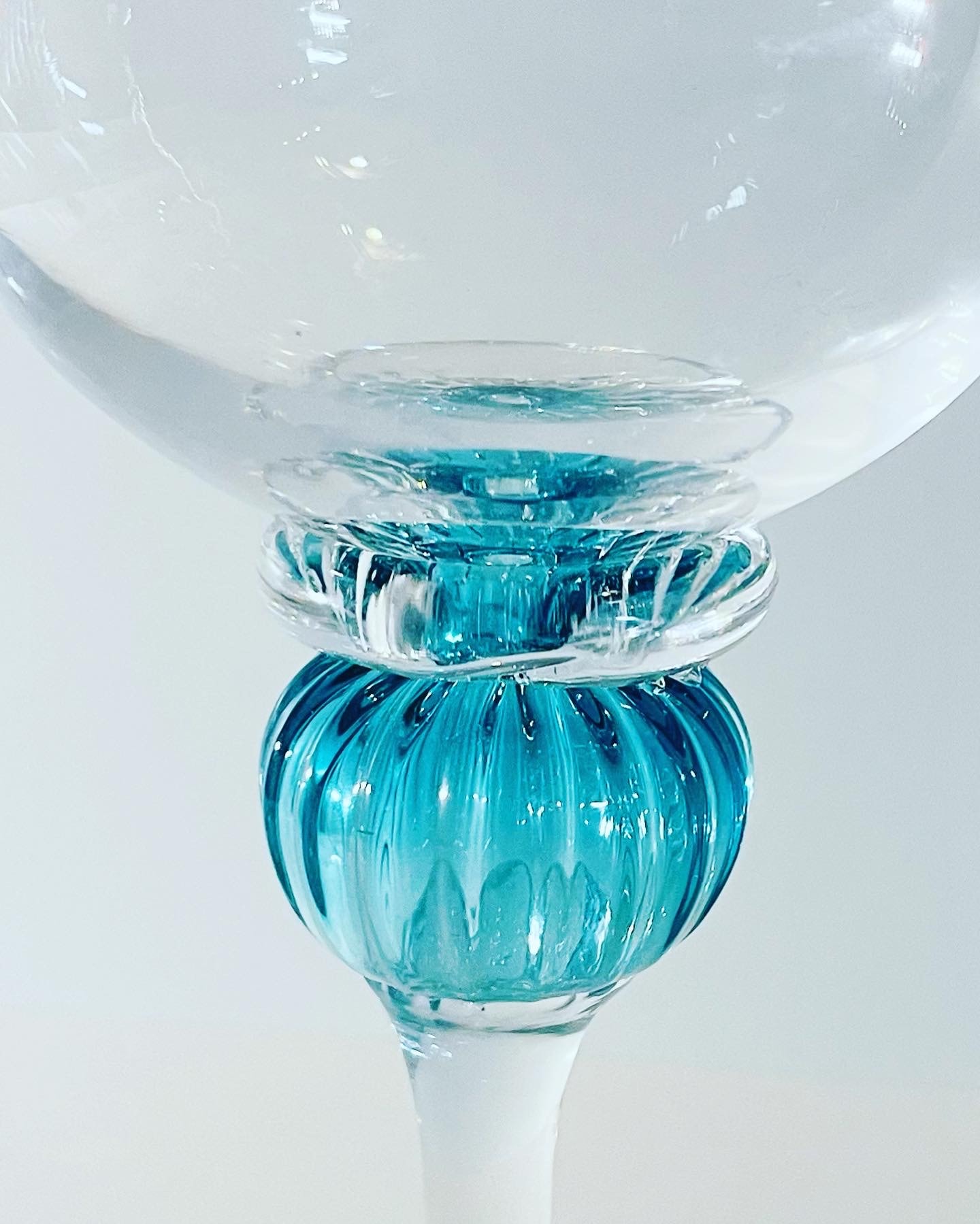 Turquoise blown glass goblet detail